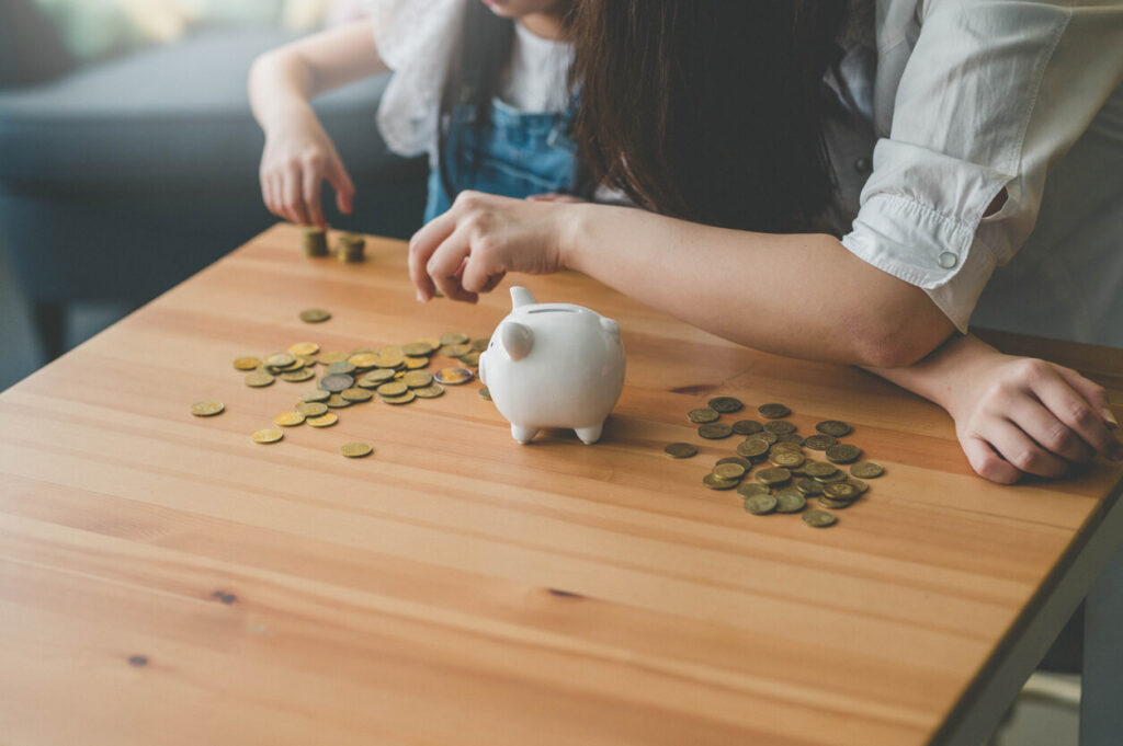 Counting money from a piggy bank